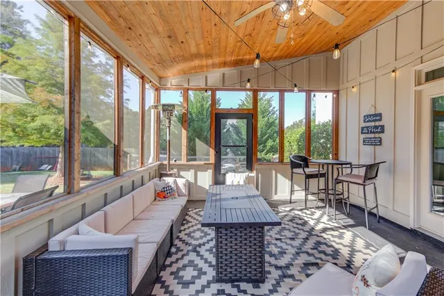 a view of a yard with plants and a trees