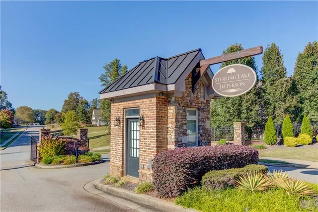 an aerial view of a house with a ocean view