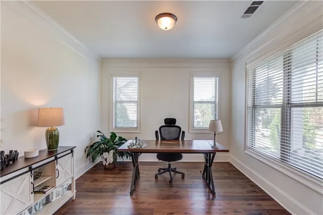 a view of dining room with furniture wooden floor and chandelier