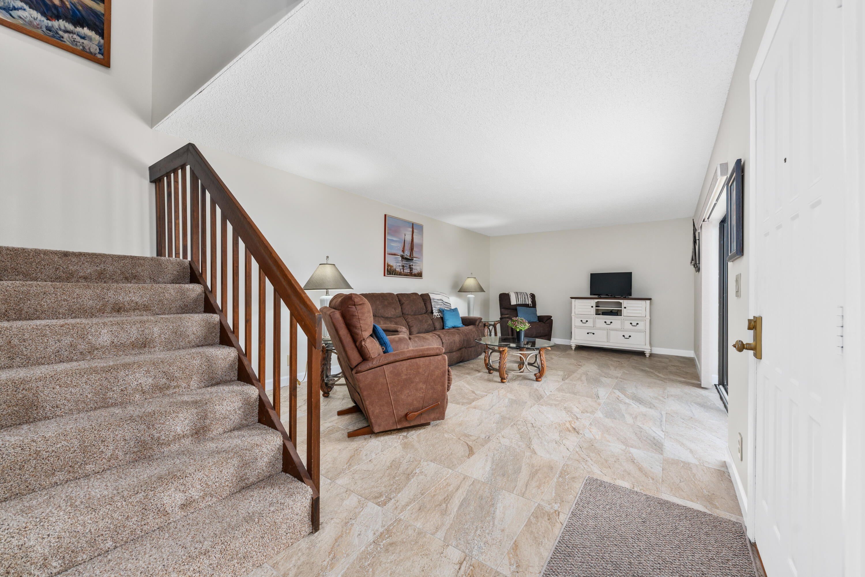 5874 Southeast Riverboat Drive, Unit 330 Stuart, FL 34997 - Photo 11 of 40 a view of entryway and livingroom