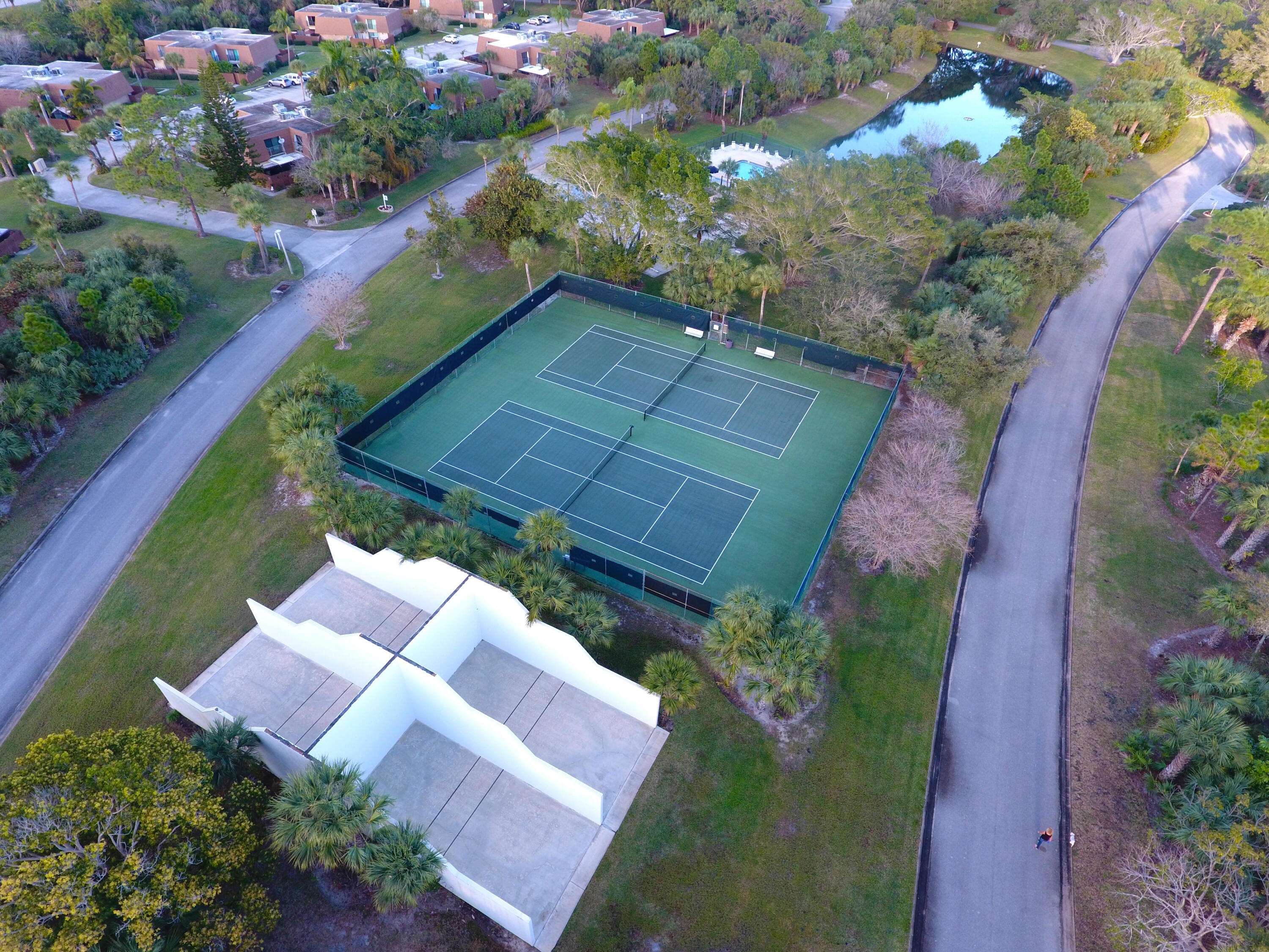 5874 Southeast Riverboat Drive, Unit 330 Stuart, FL 34997 - Photo 34 of 40 an aerial view of a house with a yard