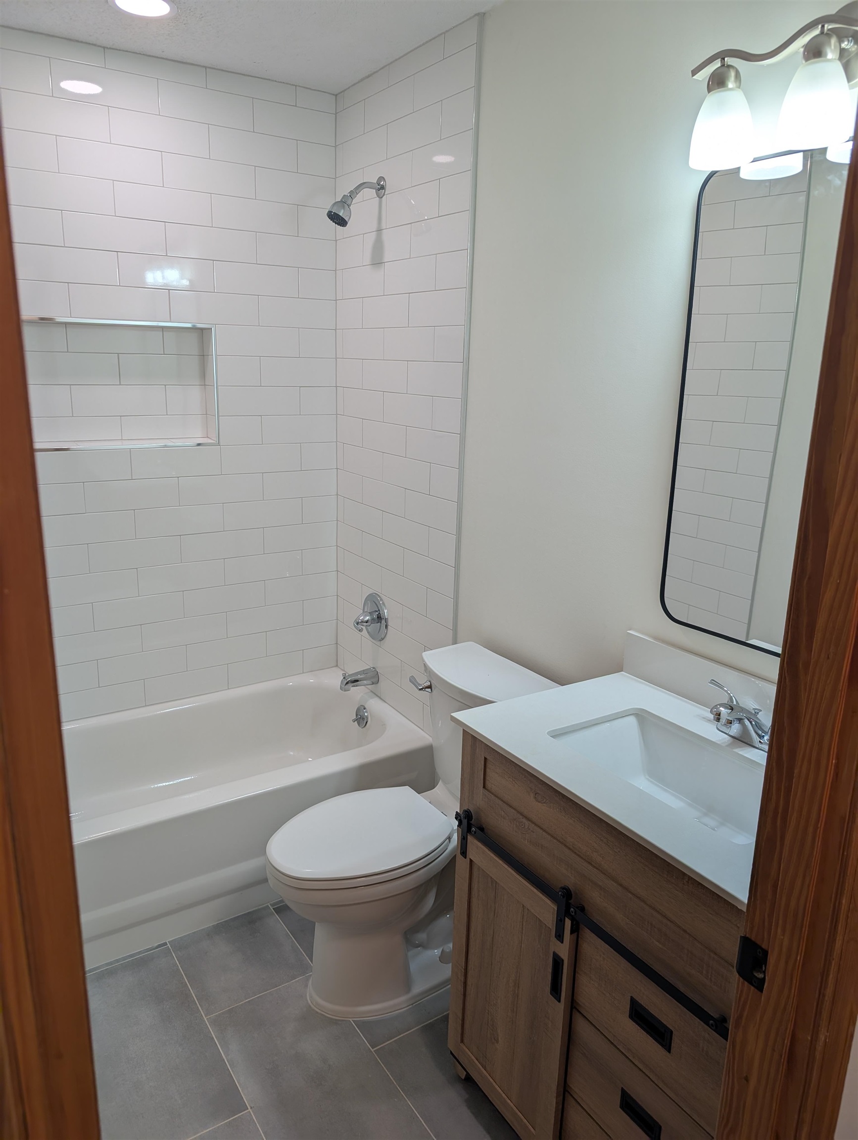 426 Homeville Road Collierville, TN 38017 - Photo 14 of 23 a bathroom with a sink a toilet and shower