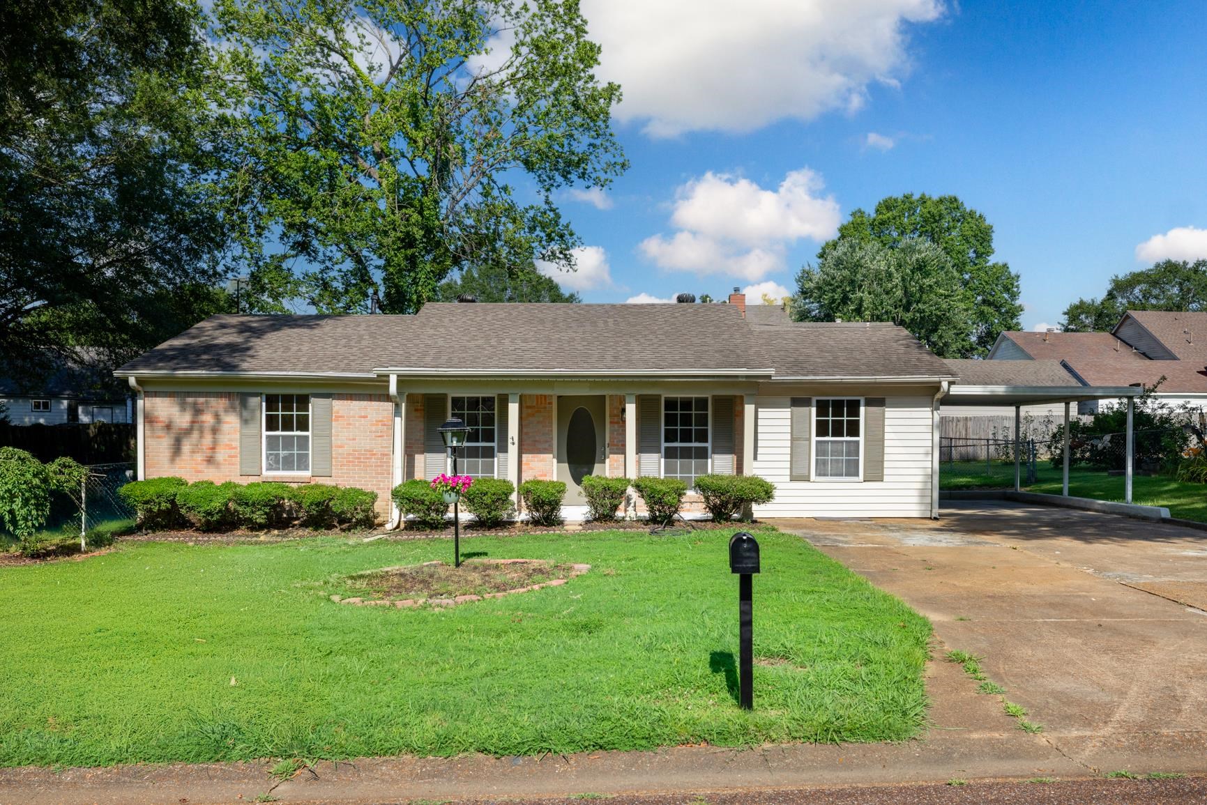 426 Homeville Road Collierville, TN 38017 - Photo 21 of 23 a front view of a house with a yard