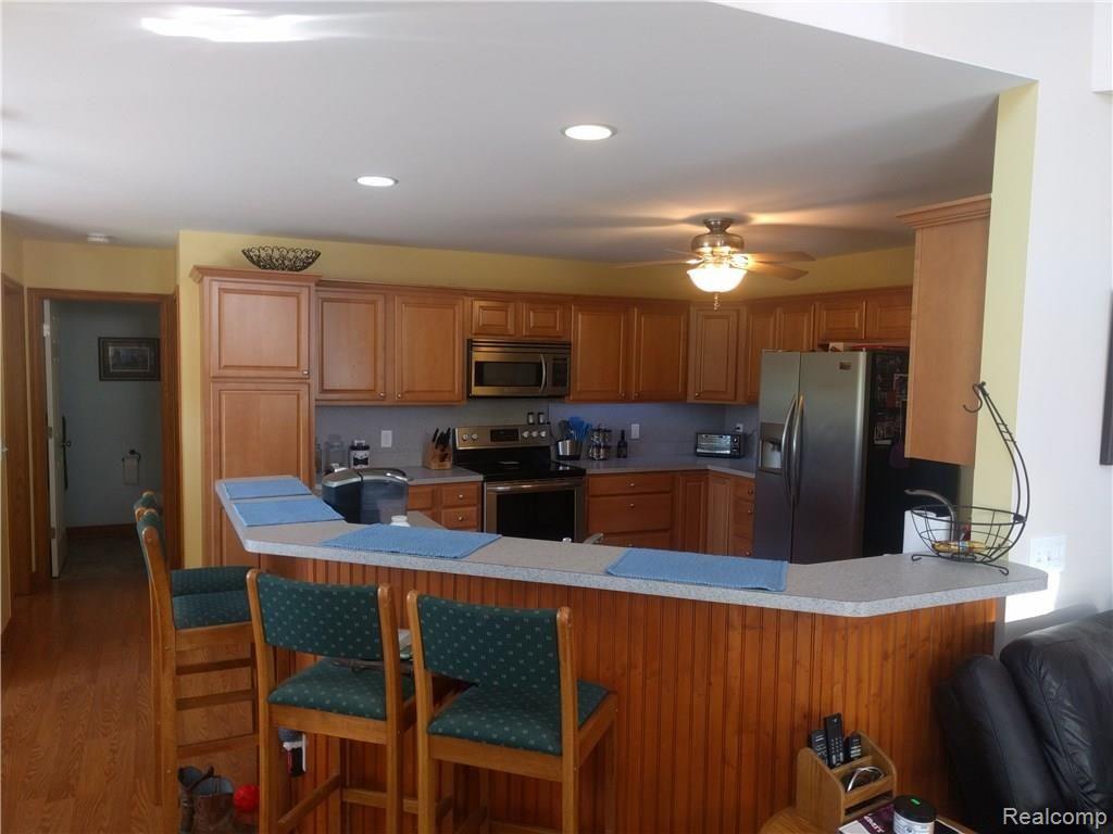 Open plan kitchen with breakfast bar