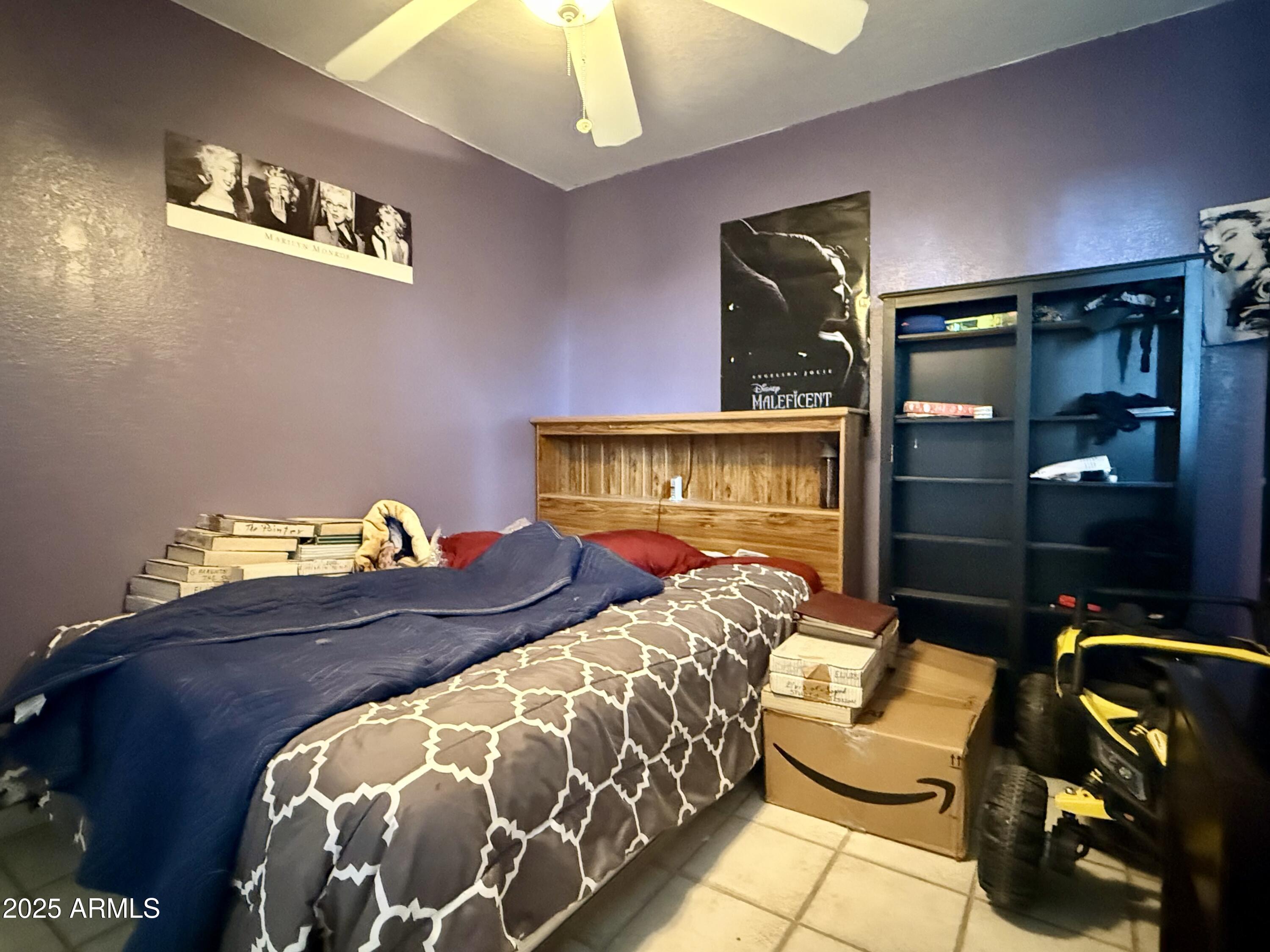 2535 East Roadrunner Ridge Tombstone, AZ 85638 - Photo 15 of 20 a bedroom with bed and balcony