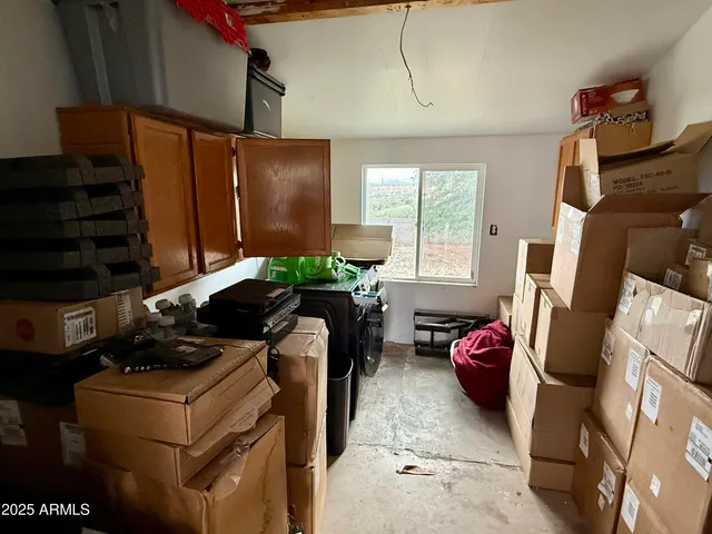 a room with furniture and a flat screen tv