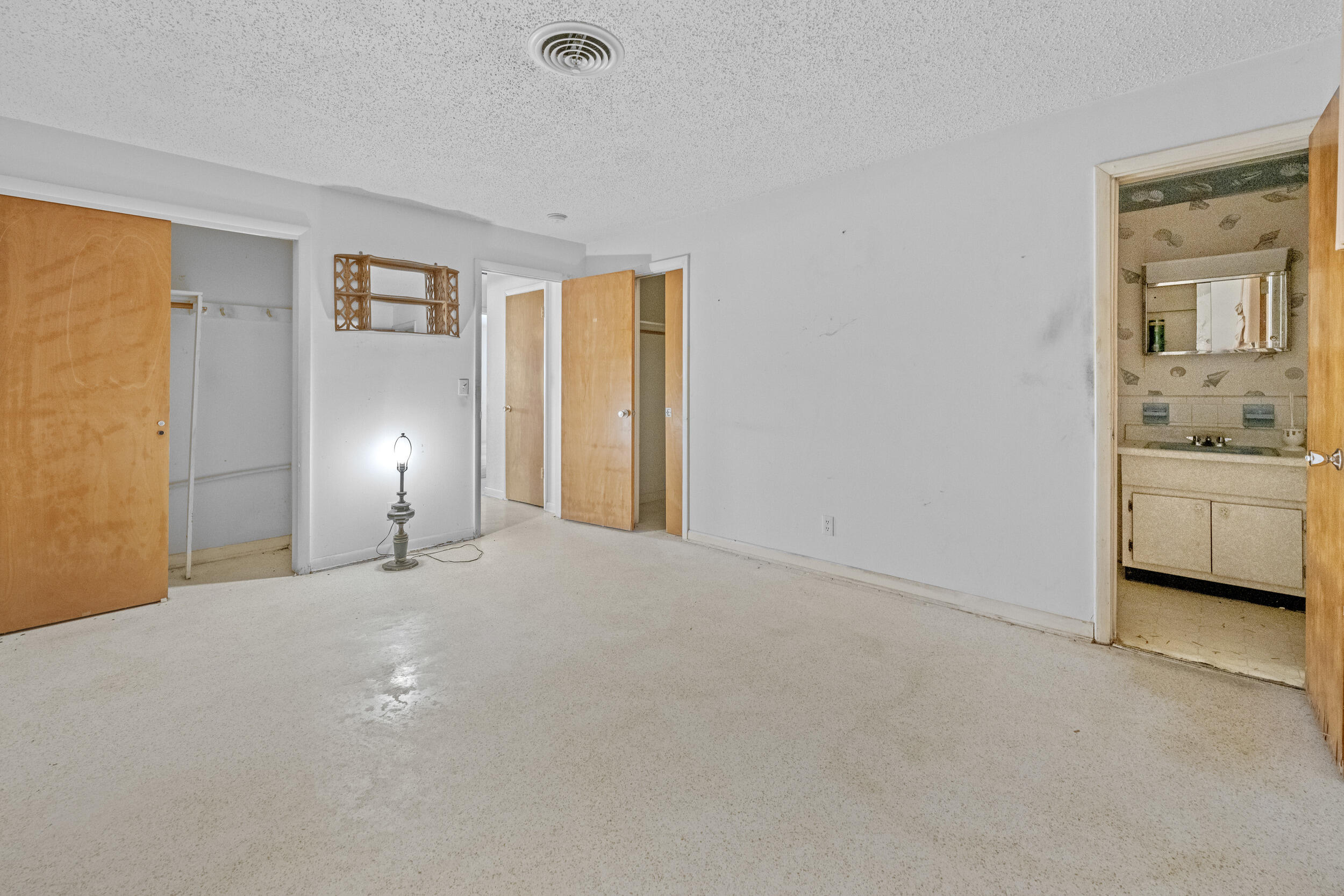 490 West 31st Street Riviera Beach, FL 33404 - Photo 13 of 29 a view of a livingroom with a furniture and window