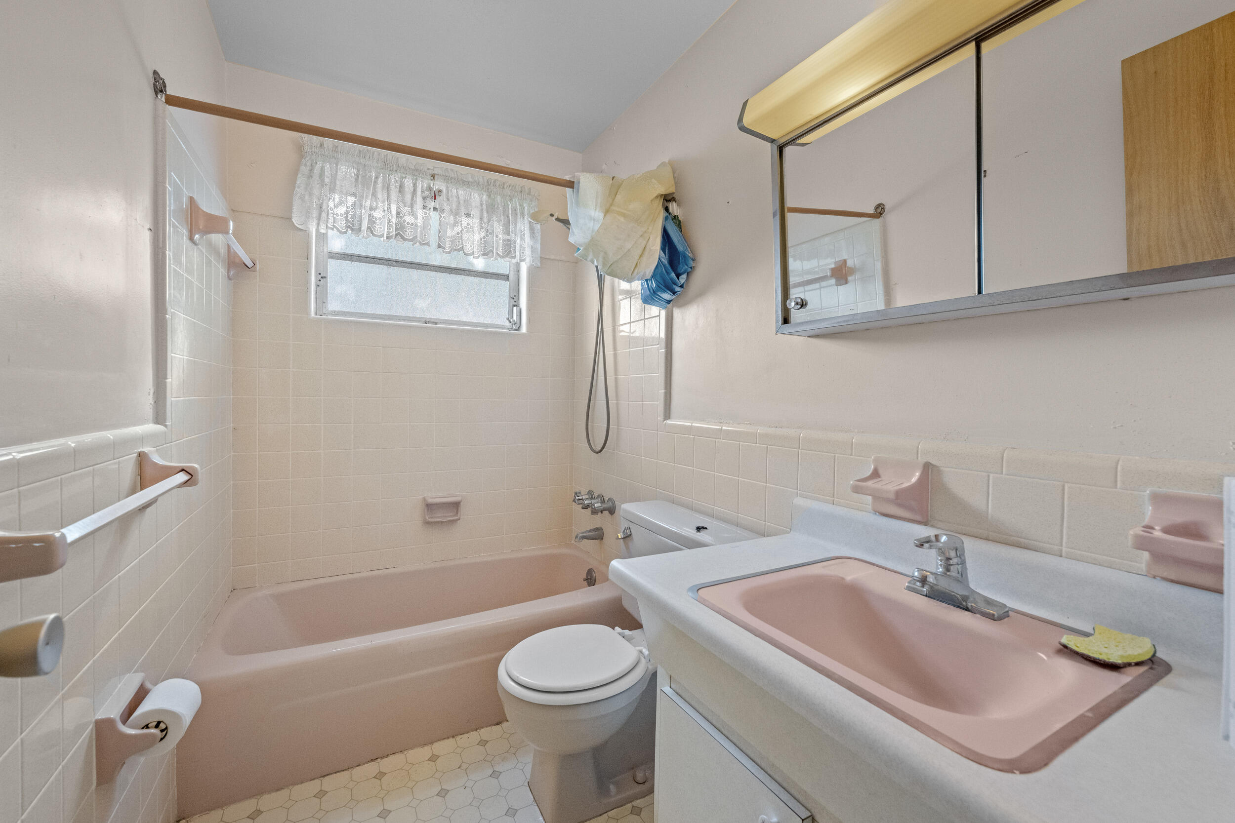 490 West 31st Street Riviera Beach, FL 33404 - Photo 18 of 29 a bathroom with a sink a toilet and shower