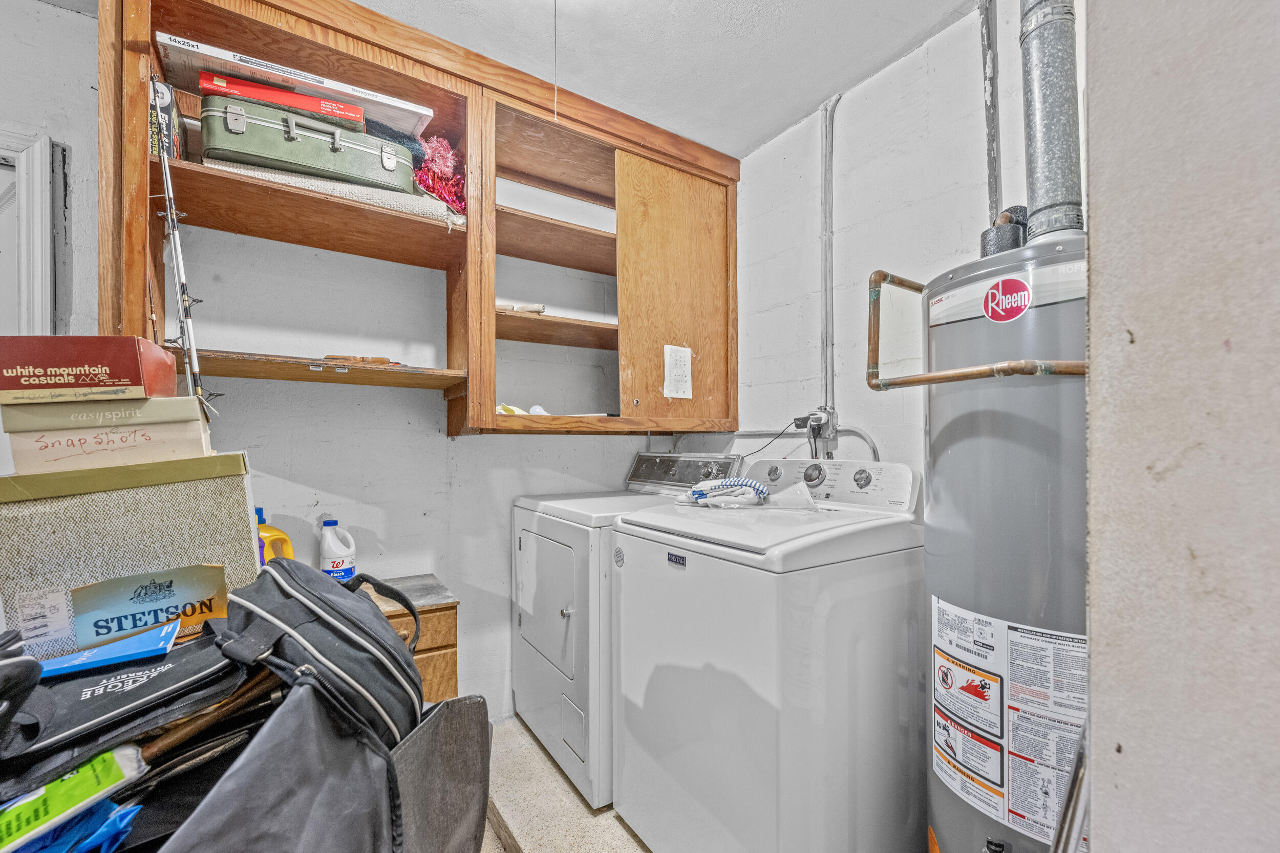 490 West 31st Street Riviera Beach, FL 33404 - Photo 21 of 29 a storage room with washer and dryer