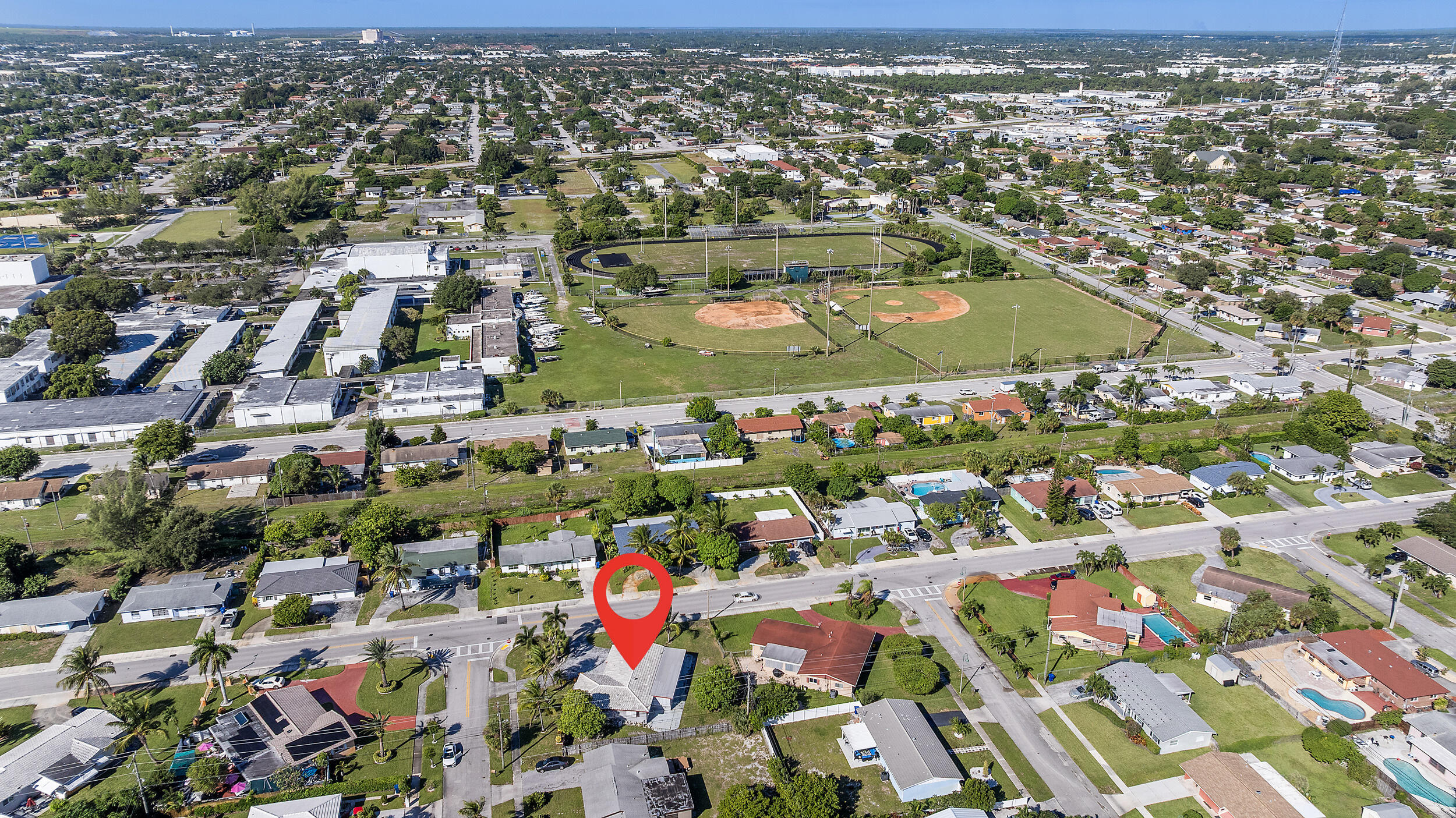 490 West 31st Street Riviera Beach, FL 33404 - Photo 29 of 29 an aerial view of a city