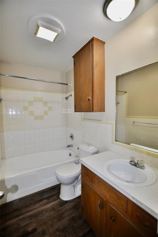 202 East Oak Street, Unit 12 Weatherford, TX 76086 - Photo 8 of 8 a bathroom with a sink and a mirror