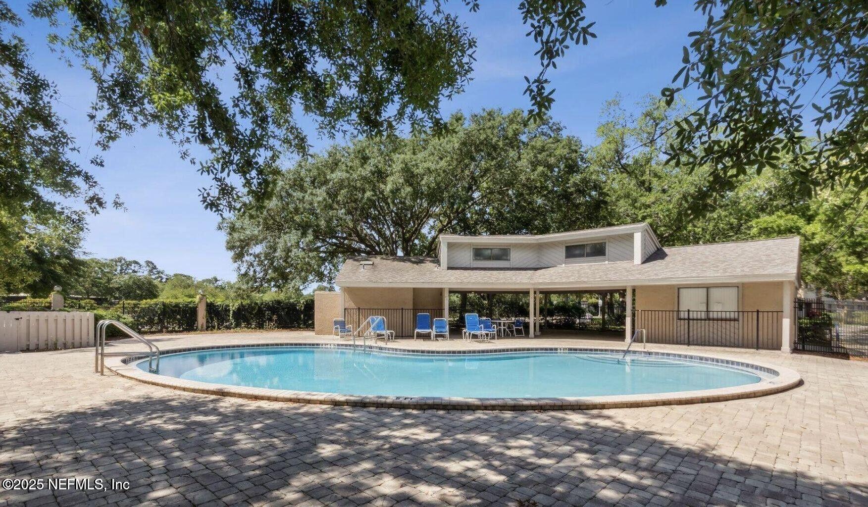 3801 Crown Point Road, Unit 1074 Jacksonville, FL 32257 - Photo 20 of 22 a view of house with outdoor space and swimming pool