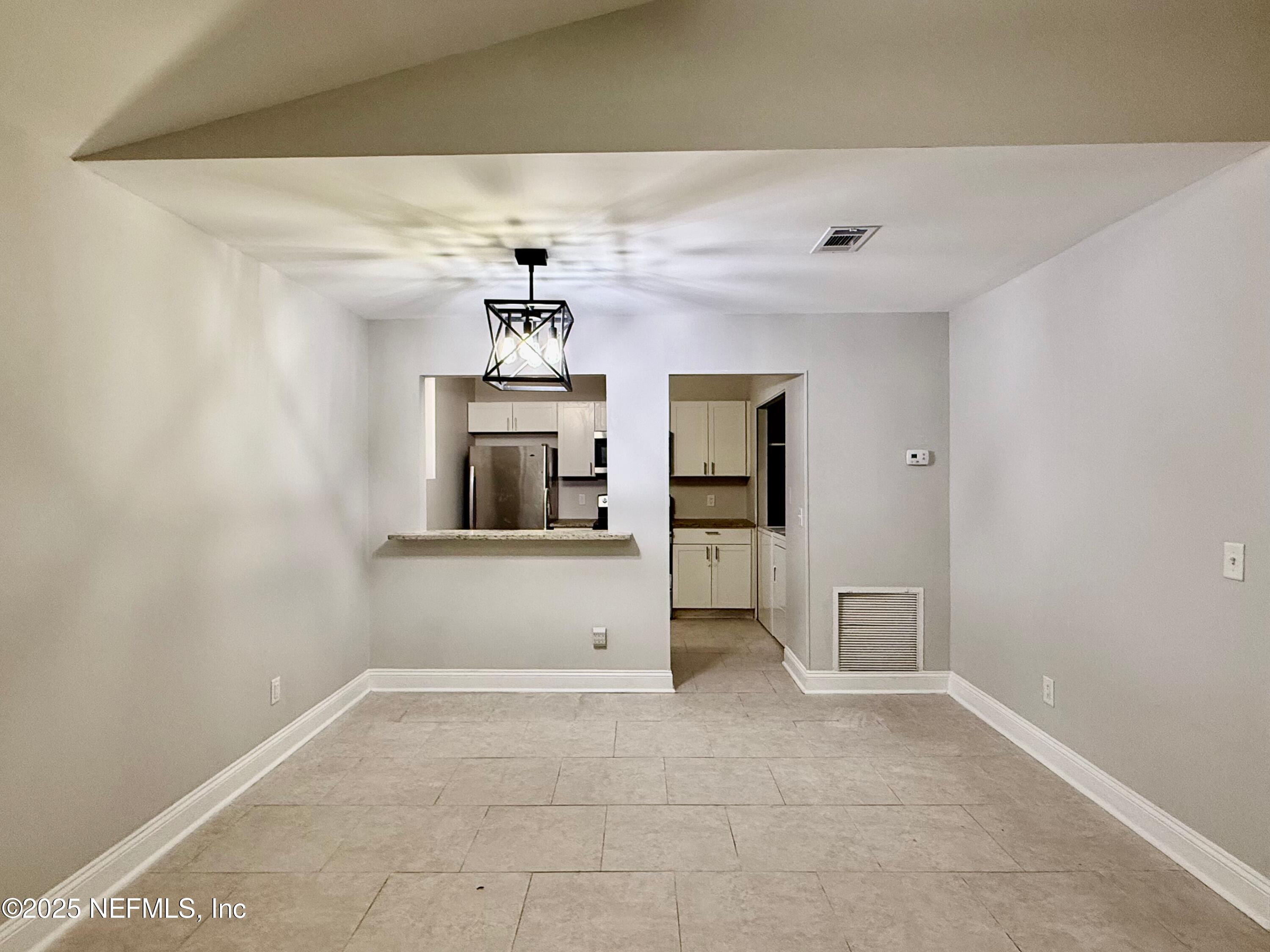 3801 Crown Point Road, Unit 1074 Jacksonville, FL 32257 - Photo 6 of 22 a view of a kitchen