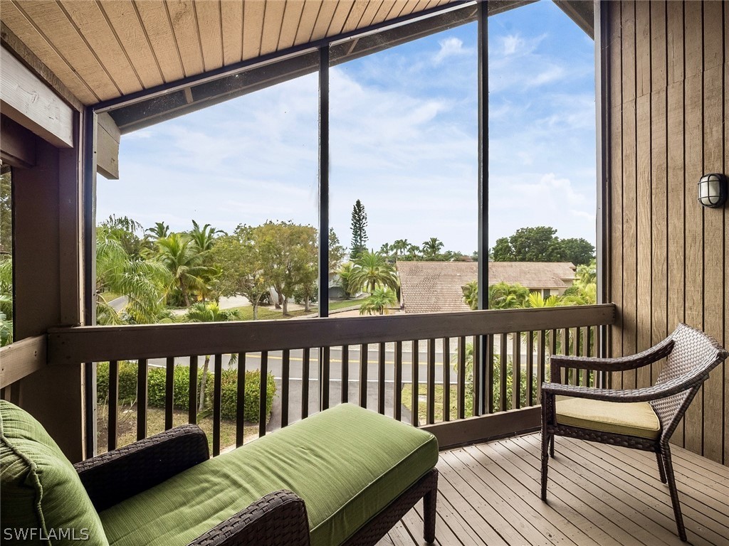 974 Sand Castle Road Sanibel, FL 33957 - Photo 22 of 31 a view of a balcony with chairs