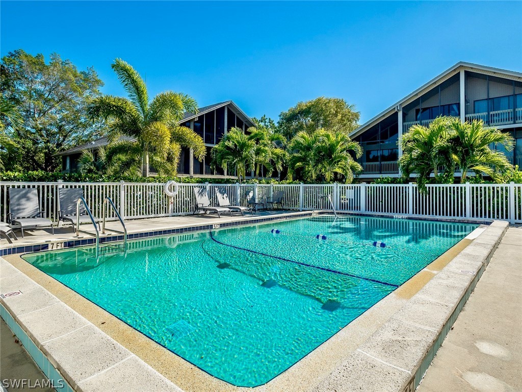 974 Sand Castle Road Sanibel, FL 33957 - Photo 25 of 31 a view of a backyard with a small pool