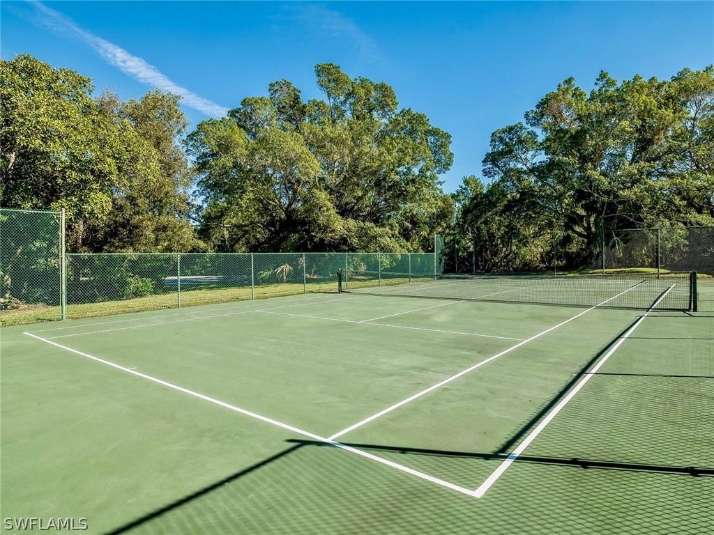 974 Sand Castle Road Sanibel, FL 33957 - Photo 26 of 31 a view of a tennis court