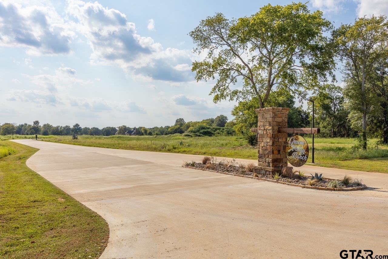 12372 Madison Crossing Bullard, TX 75757 - Photo 2 of 13 a view of a lake with a yard