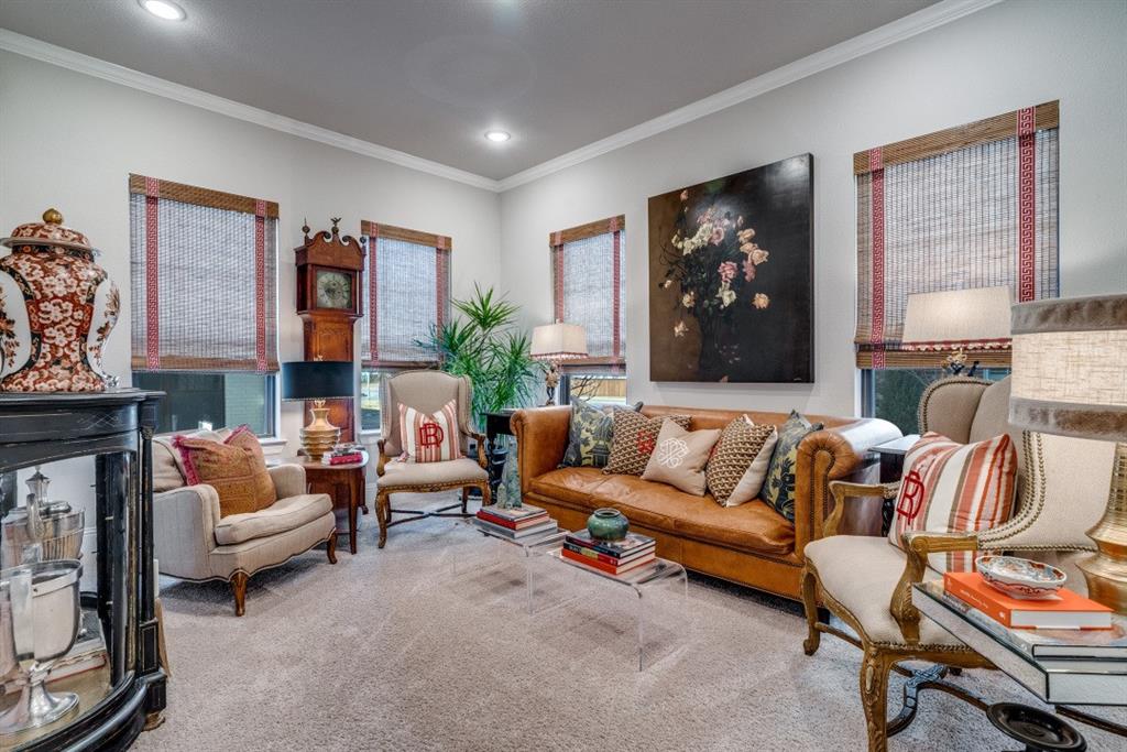 307 Sunset Lane, Unit 101 Fort Worth, TX 76114 - Photo 14 of 37 a living room with furniture and a fireplace
