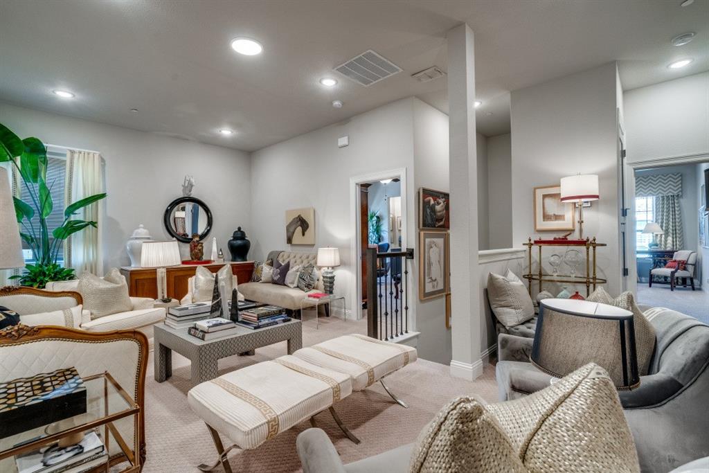 307 Sunset Lane, Unit 101 Fort Worth, TX 76114 - Photo 17 of 37 a living room with furniture a rug and a large window
