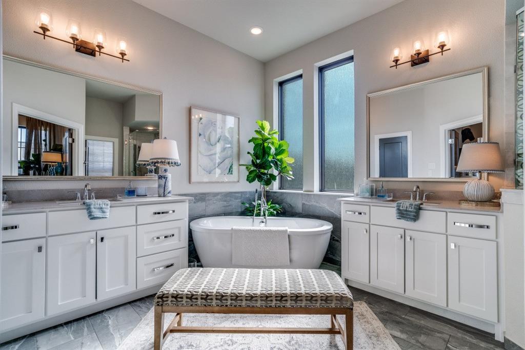 307 Sunset Lane, Unit 101 Fort Worth, TX 76114 - Photo 25 of 37 a living room with furniture a chandelier a sink and a mirror