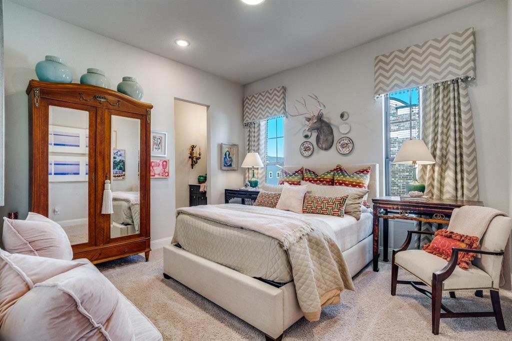 307 Sunset Lane, Unit 101 Fort Worth, TX 76114 - Photo 28 of 37 a bed room with a bed and a couch