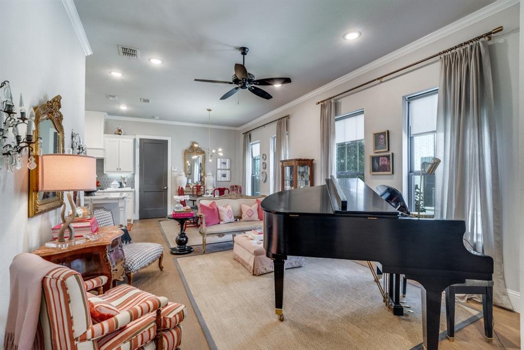 307 Sunset Lane, Unit 101 Fort Worth, TX 76114 - Photo 3 of 37 a living room with furniture and a flat screen tv