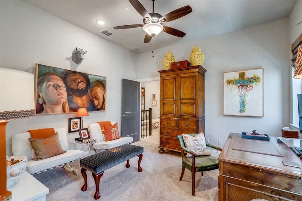 307 Sunset Lane, Unit 101 Fort Worth, TX 76114 - Photo 31 of 37 a living room with furniture and wooden floor