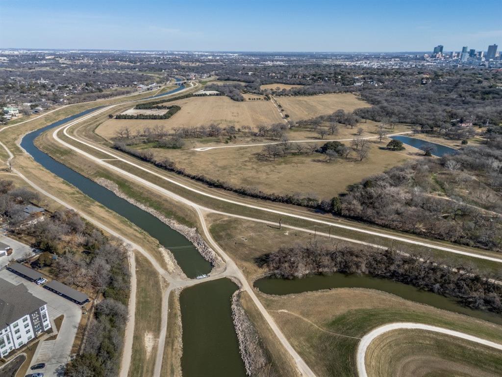 307 Sunset Lane, Unit 101 Fort Worth, TX 76114 - Photo 37 of 37 a view of a water heater and a floor