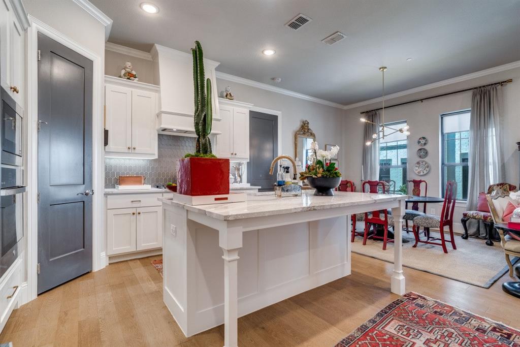 307 Sunset Lane, Unit 101 Fort Worth, TX 76114 - Photo 8 of 37 a kitchen with a sink appliances and cabinets