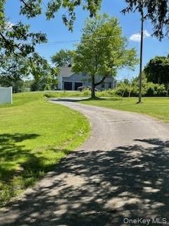 179 Riley Road New Windsor, NY 12553 - Photo 7 of 7 a front view of a house with a yard