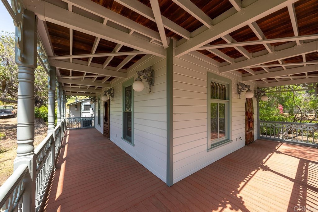13510 Jamul Drive Jamul, CA 91935 - Photo 17 of 18 a view of a porch with wooden floor