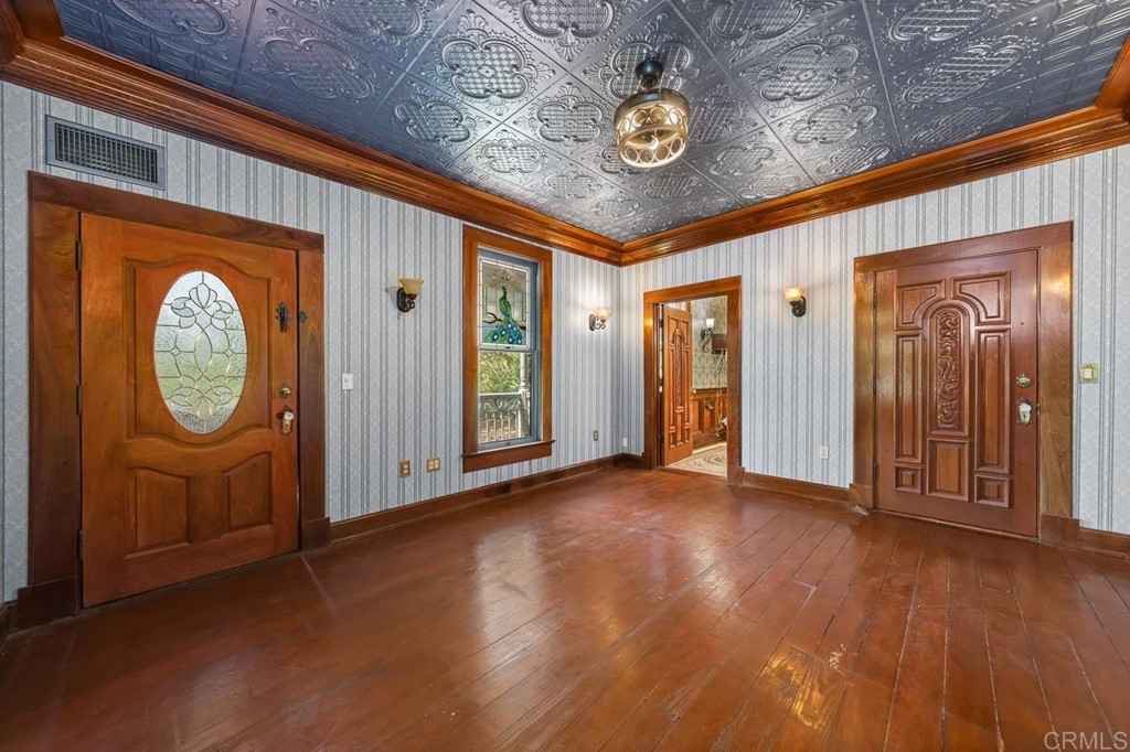 13510 Jamul Drive Jamul, CA 91935 - Photo 8 of 18 a view of a hallway with wooden floor