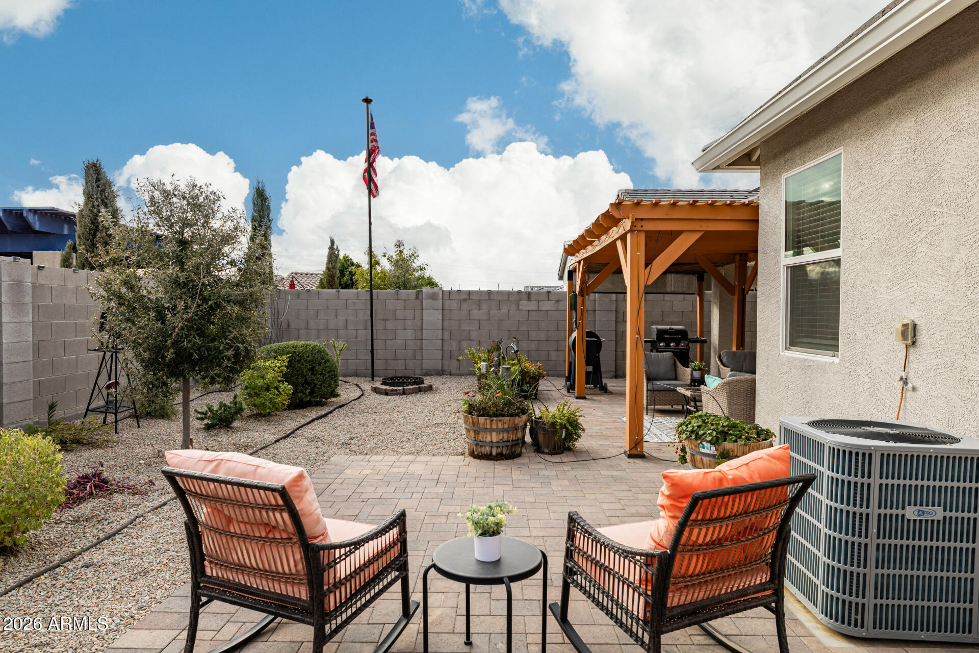 9471 Greenhouse Road Florence, AZ 85132 - Photo 2 of 22 a view of a chairs and tables in the patio