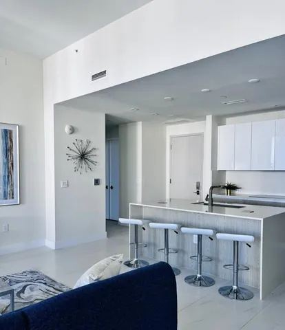 a bedroom with a bed and a table