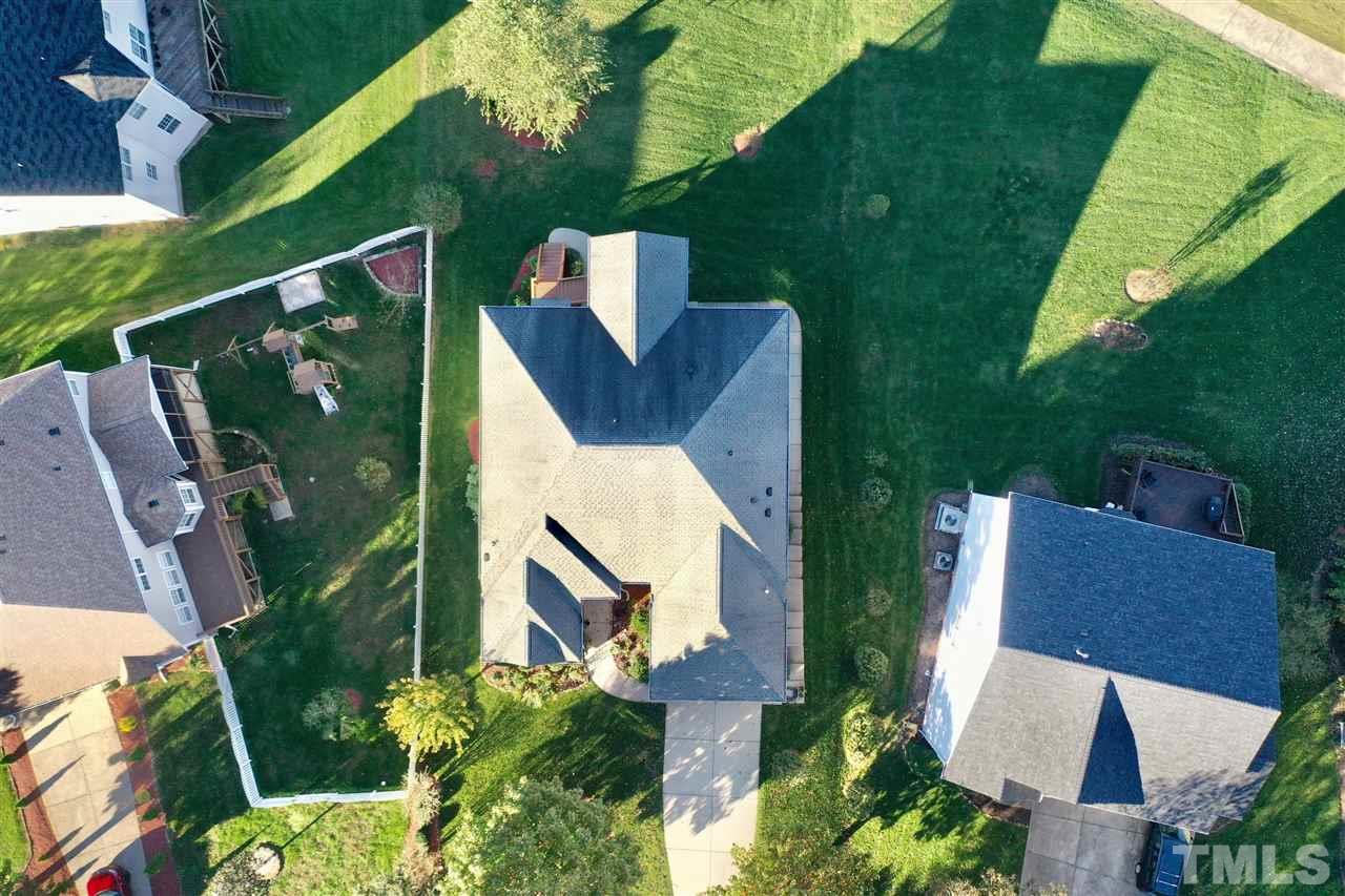 116 Okamato Street Raleigh, NC 27603 - Photo 2 of 19 an aerial view of house with yard swimming pool and outdoor seating