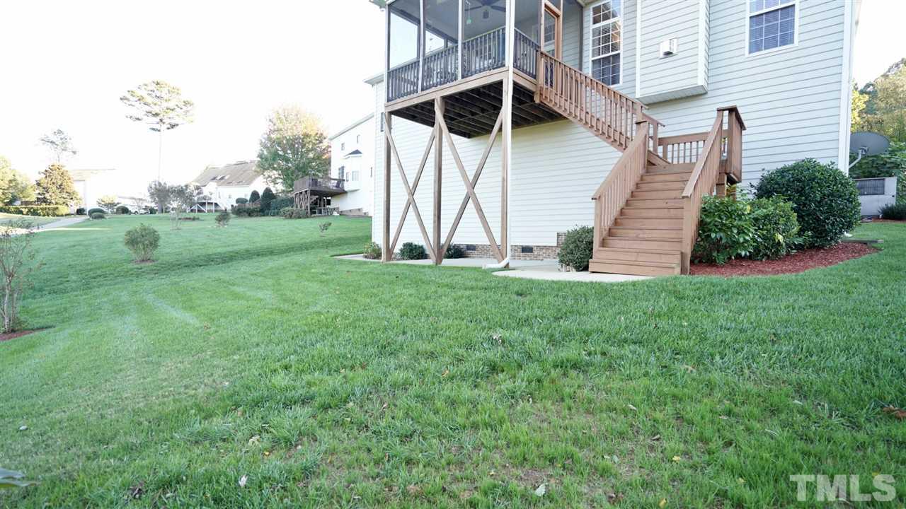 116 Okamato Street Raleigh, NC 27603 - Photo 18 of 19 a view of a house with a yard