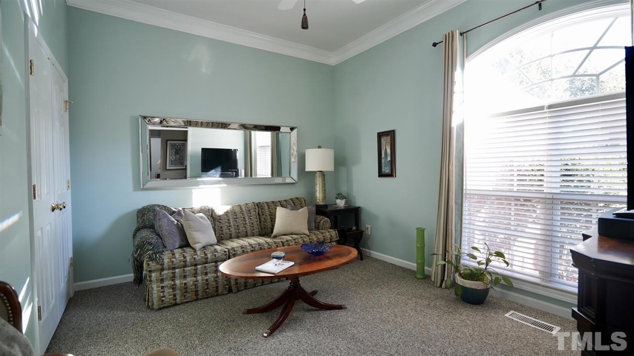 116 Okamato Street Raleigh, NC 27603 - Photo 4 of 19 a living room with furniture and a window