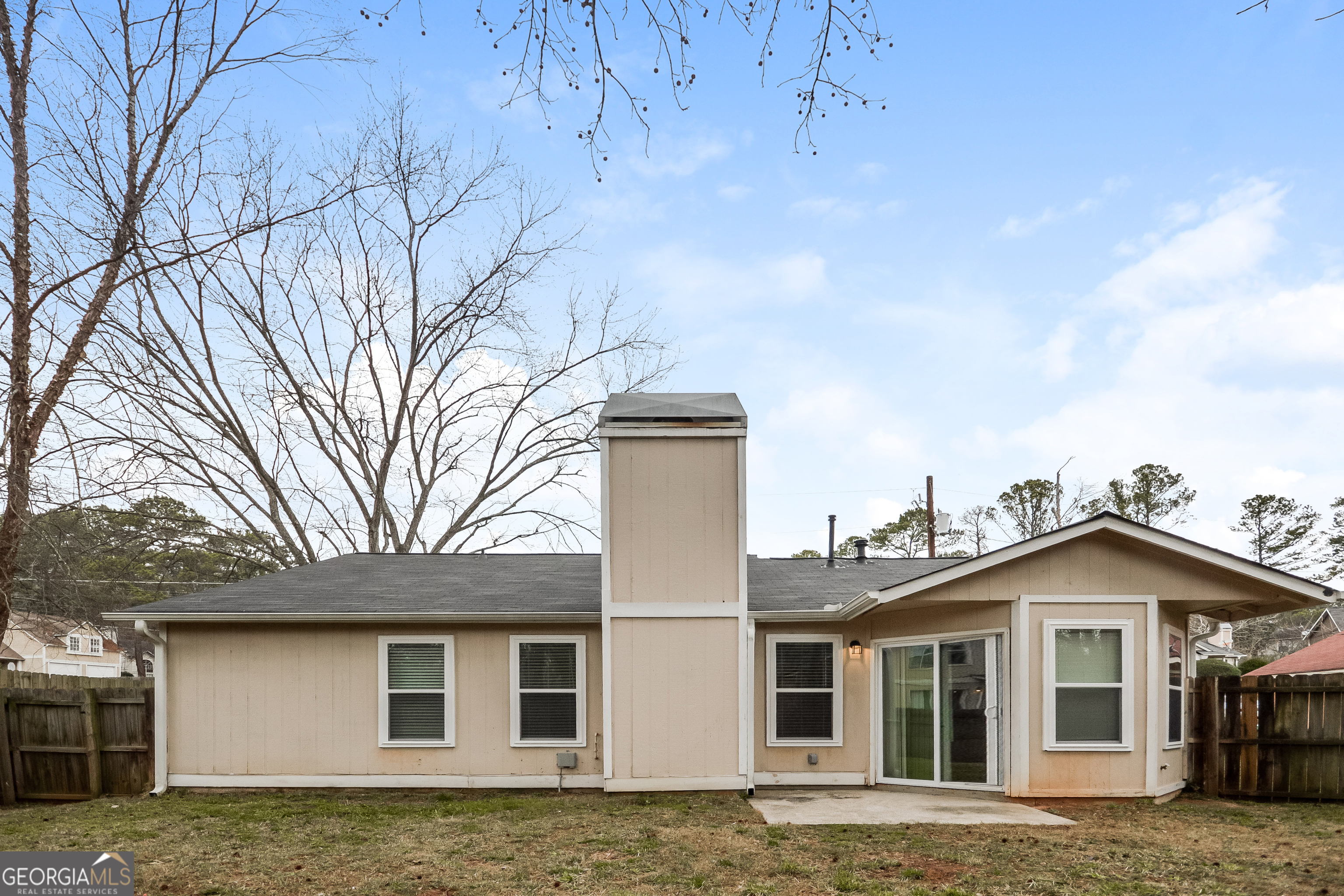 5456 Panola Downs Road Lithonia, GA 30058 - Photo 16 of 16 front view of a house with a yard