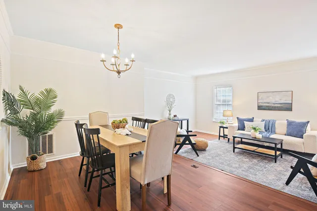 a view of a livingroom with furniture and a table
