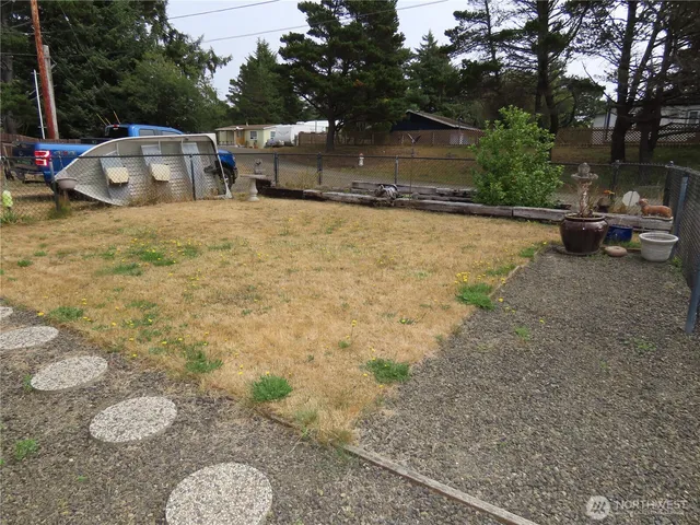 a view of a patio with table and chairs a barbeque with potted plants