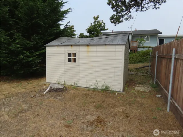 a view of backyard of house