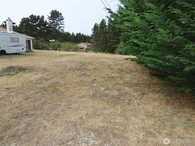 a backyard of a house with lots of green space