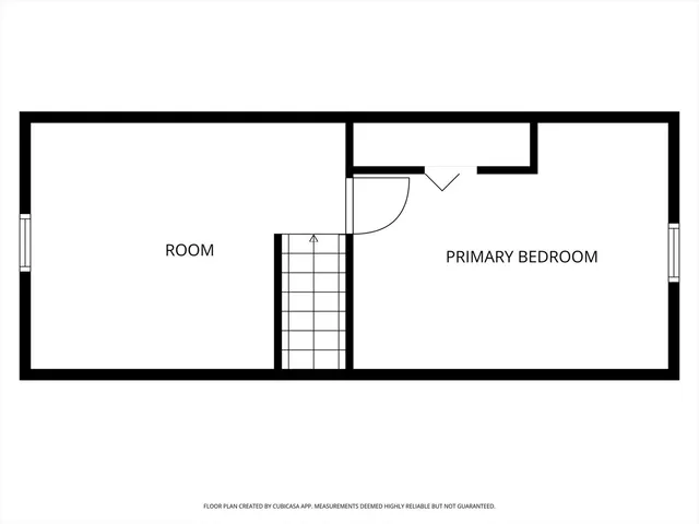 a black and white photo of a living room