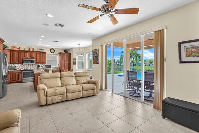 a bed room with a bed and a chair