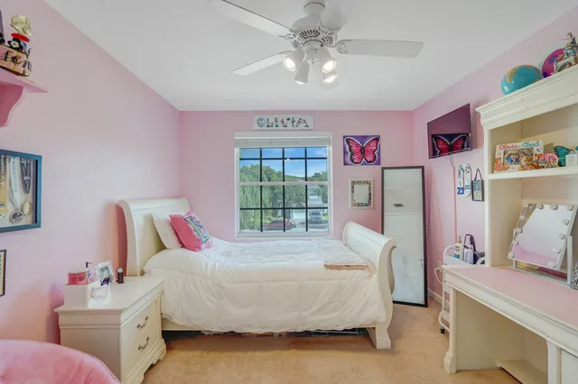 an aerial view of a city with lots of residential buildings lake and ocean view