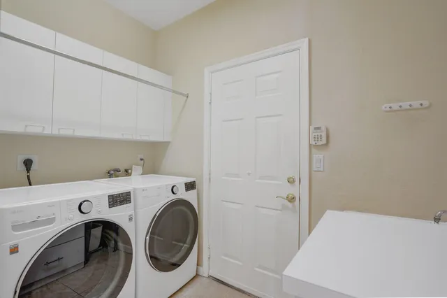 a view of a house with swimming pool