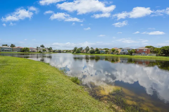 an aerial view of multiple houses with outdoor space