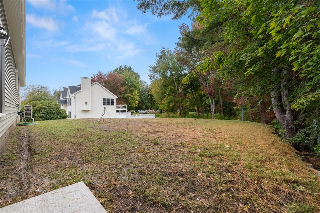 86 Ferry Road Salisbury, MA 01952 - Photo 6 of 28 a view of white house with a yard
