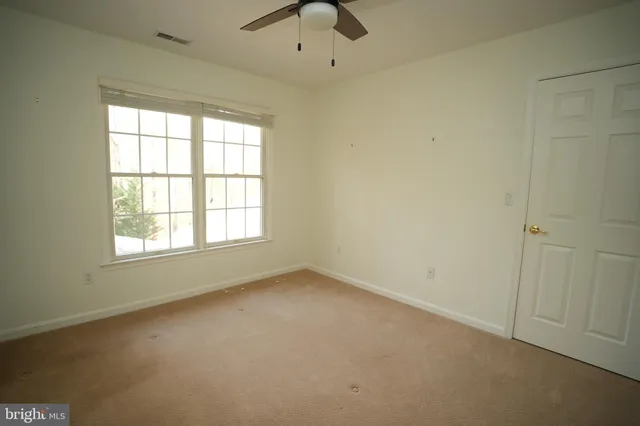 an empty room with a window