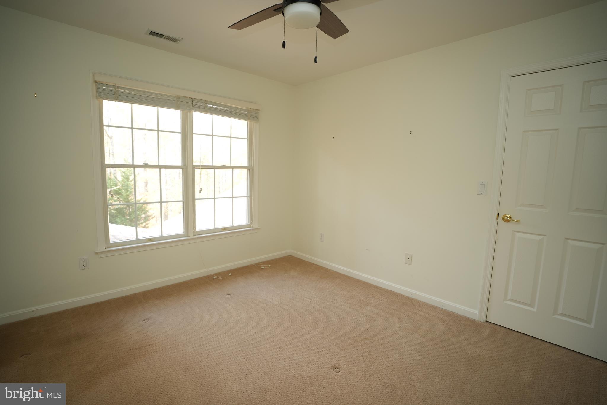 23293 Misty Pond Lane California, MD 20619 - Photo 22 of 35 an empty room with a window
